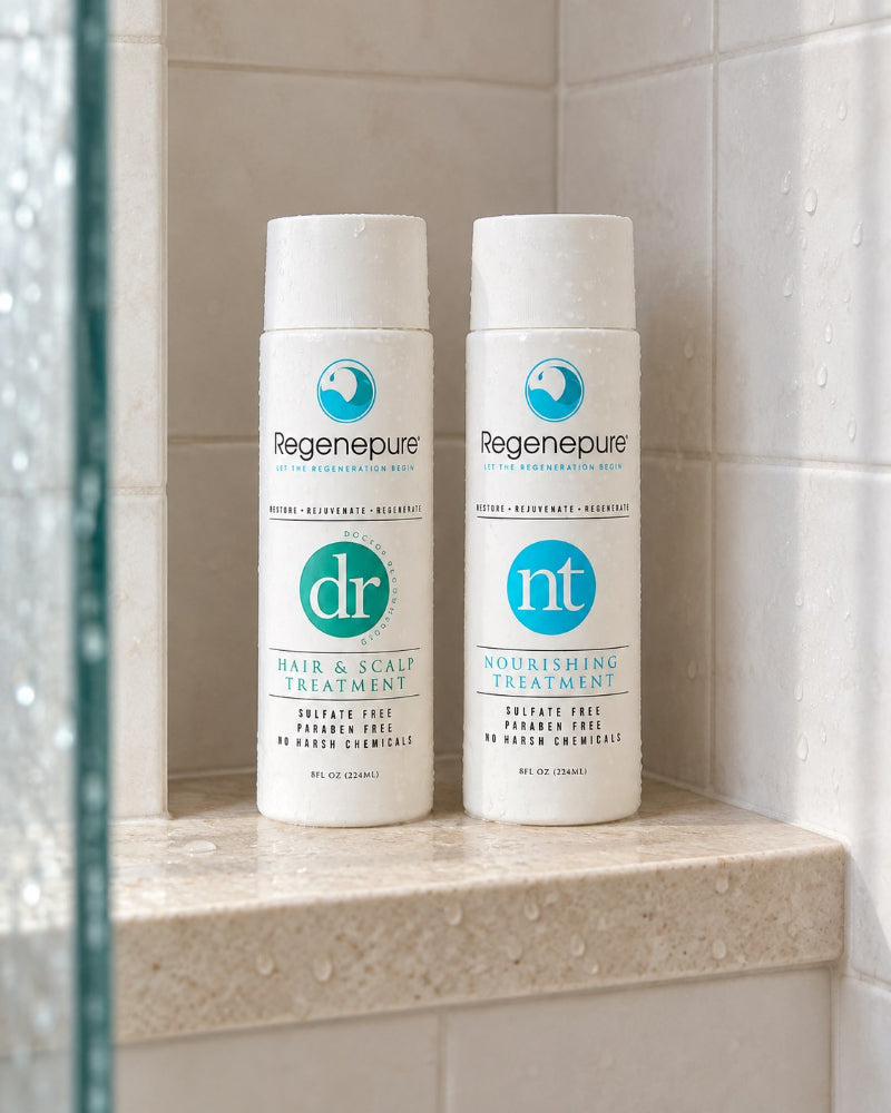 Regenepure DR and NT shampoos on a shower shelf